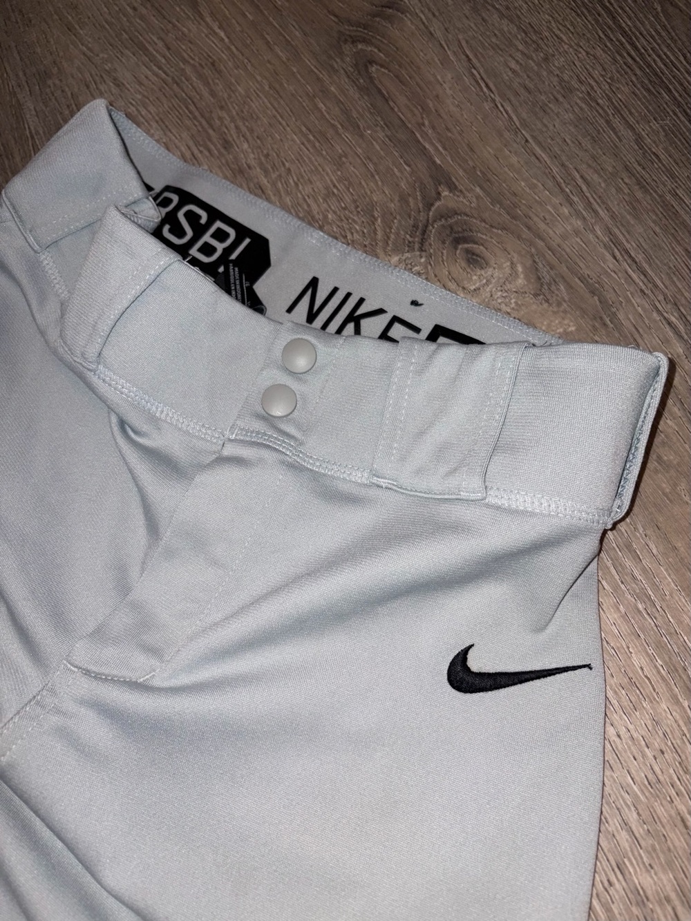 Nike Kids White Baseball Pants with Black Swoosh Accent